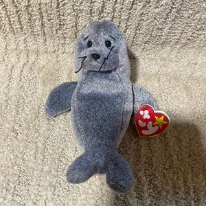 Ty Beanie Baby Slippery. Gray seal. No flaws.